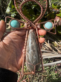Black moonstone with amazonite spheres on the arms and epidote at the top of a 9.5 in copper wirewrapped ankh