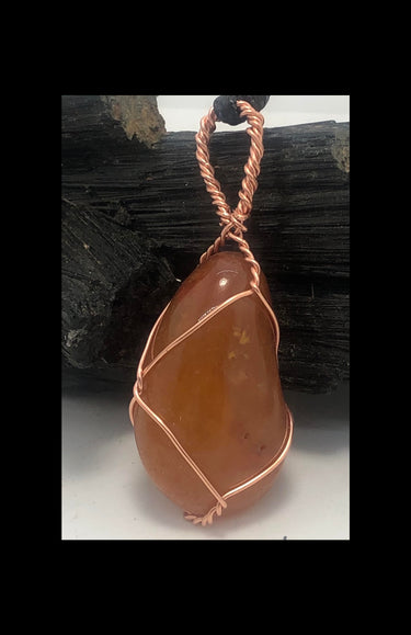 carnelian pendants, money stones, anxiety stones, abundance stones, peace stones, tranquility stones, crystal pendants